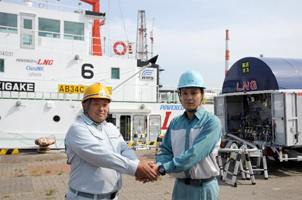 Sakigake captain with tank truck operator