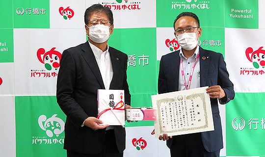 行橋市へマスク寄贈の写真